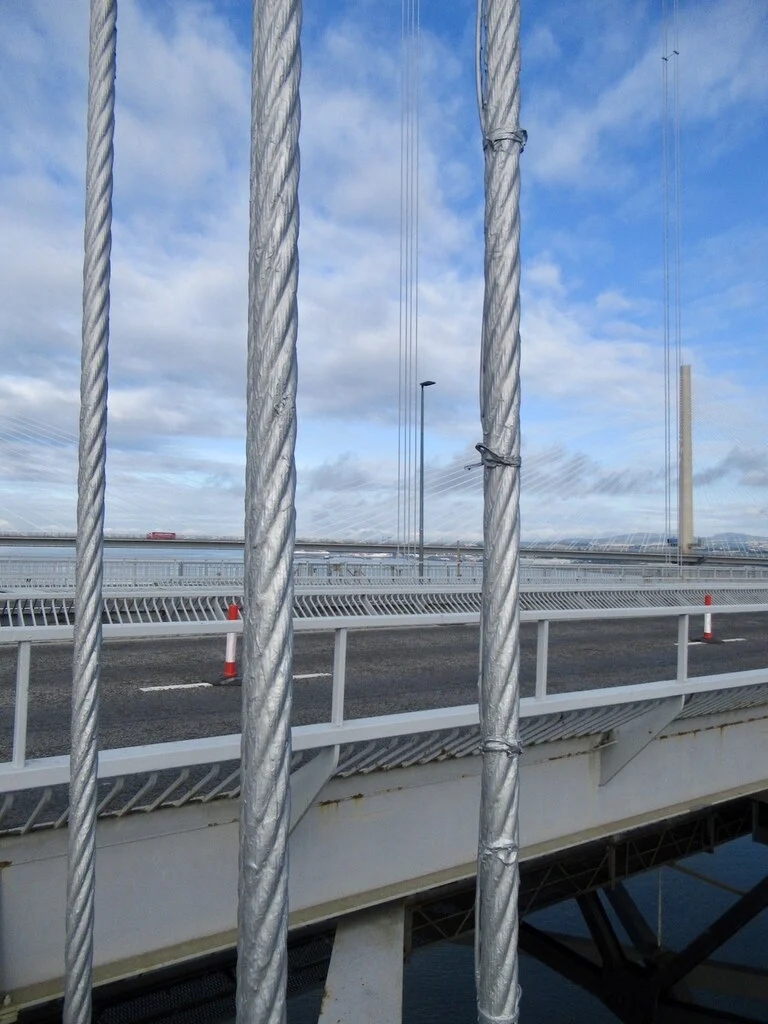 Bridge tower and suspension cables